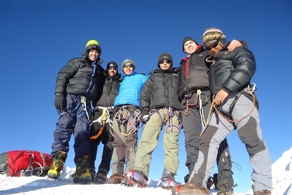 Rabindra with hikers in mountain trek gear